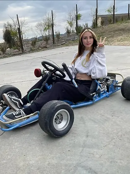 Busty Beauty Outdoors with a Stunning Smile