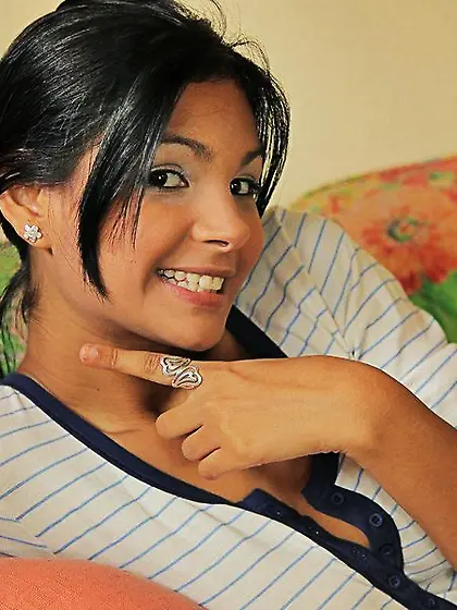 Raven haired latina Karla Spice strips down to her panties and s