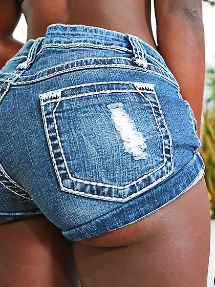 Soaping up the big fat ass of the redheaded ebony before sex