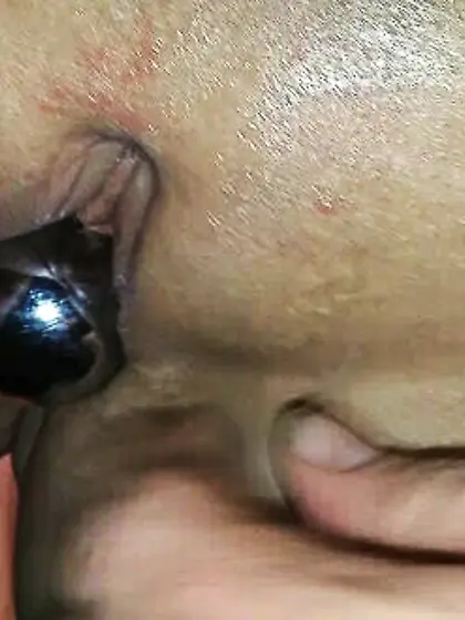 Ball inserting in bald pussy with a bell in the b