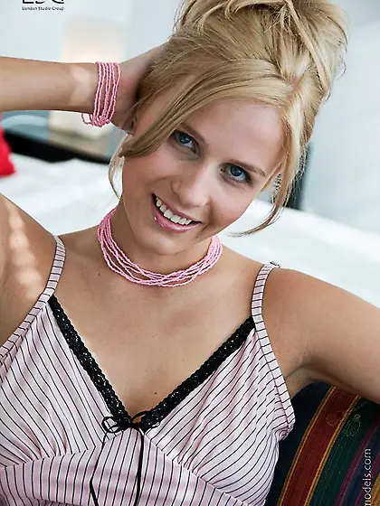 Playful blonde Keira Moon touches her perfect big boobs and show