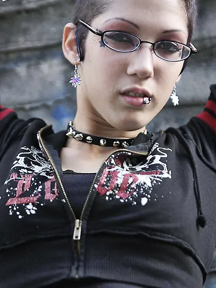 Sexy goth girl with glasses and mohawk shamelessly exposes her p