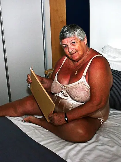 Shabby elderly blonde wearing