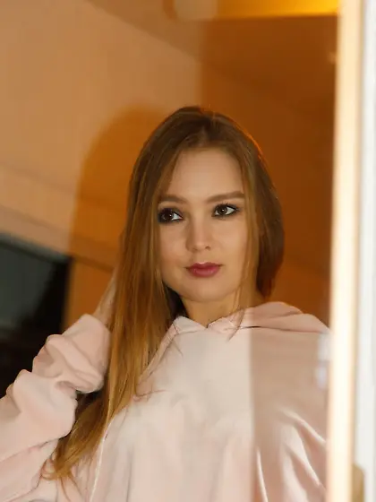 Topless blonde poses in sexy black pantyhose