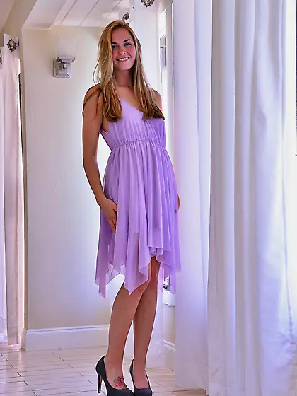 Seducing blonde chick Bailey Rayne is posing with the sheer piec