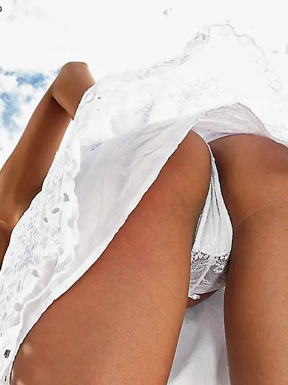 Playful bimbo Rosemary Radeva lifts the skirt up and shows panti