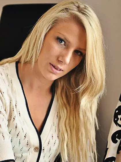 Lecherous blond gal sensually poses naked to reveal her sweetest