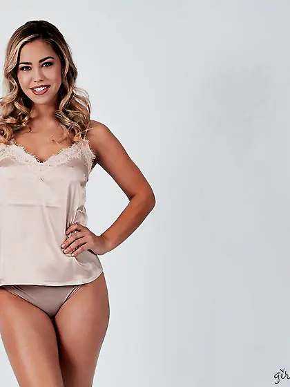 Curvy blonde hottie posing in silk top and...