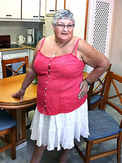 Good-looking blonde granny bright