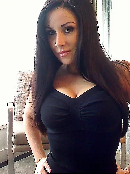 Big boobed brunette temptress Sweet Krissy is very proud of her