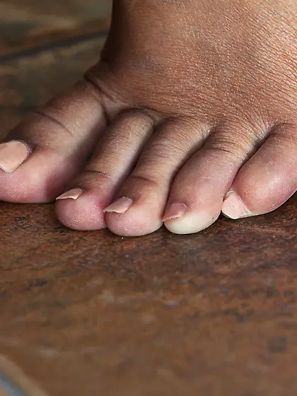 Transparent get-up brunette loves her own feet, her tiny tits an