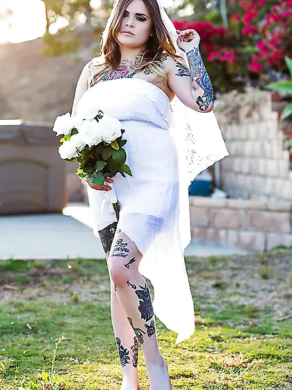 Colleen in white has a tattooed body including nipples to expose