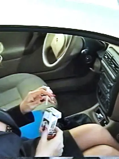 Horny blonde darling smokes a cigarette in...