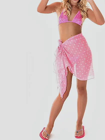 Blonde girl in big pink hat Vanda Lust taking off bikini and pos