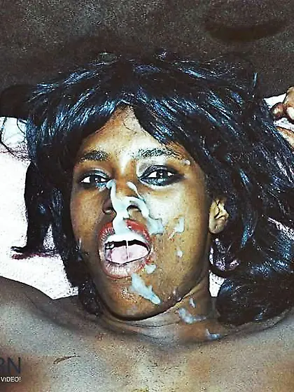 Dark doll getting her face creamed