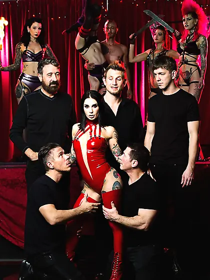 Whore in red gives sexual pleasure to all the boys who jazz with