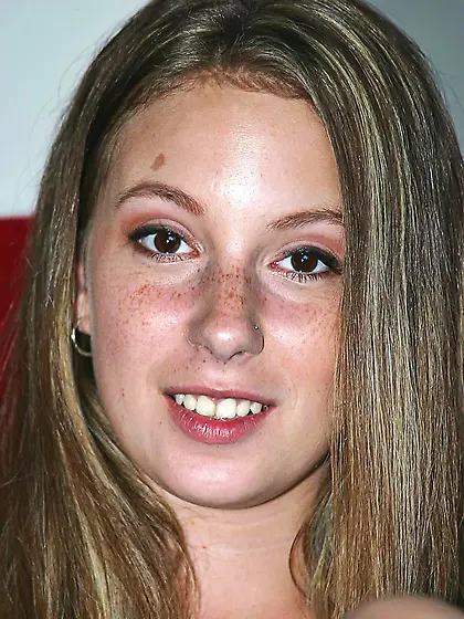 Christie Lee shows her hairless crotch after she pulls down her