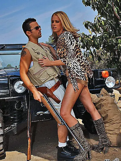 Slutty blonde hoe Nicole Sheridan strips in the sand and bangs a