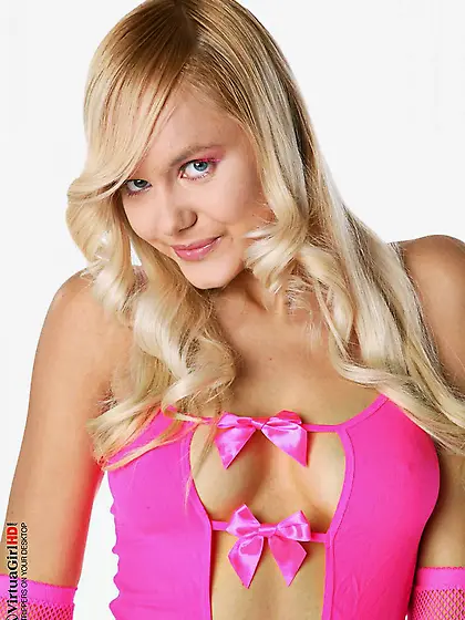 Natalia V is blonde and she is clever.  First she poses in a dres