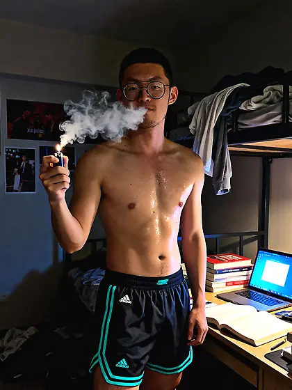 Sports Asian wearing Glasses & Spun Out in Dorm