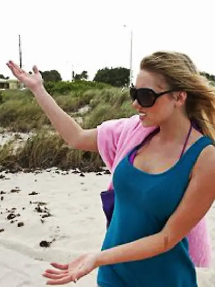 Bodacious slim MILF demonstrates a pair of round tits and gets p