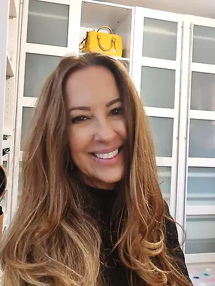 Virginia strikes a pose while showing her tits