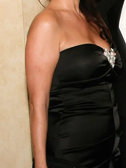 Virginia strikes a pose while showing her tits