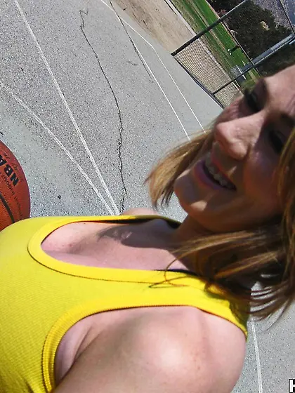 Sporty balgagged girl Amber Ashley gets tied to a bench and fuck