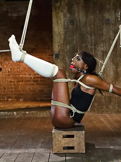 Ebony spills cum tied