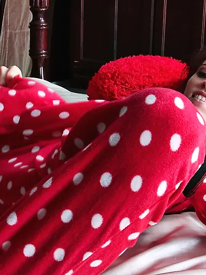 PJs-wearing busty teen spreading her pussy lips and playing arou