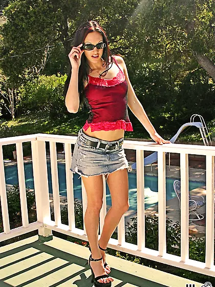 Taylor Rain posing on her terrace,  gets off her sexy clothes and