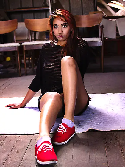 Exotic babe strips teases