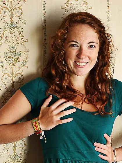 Sweet redhead teases foxy