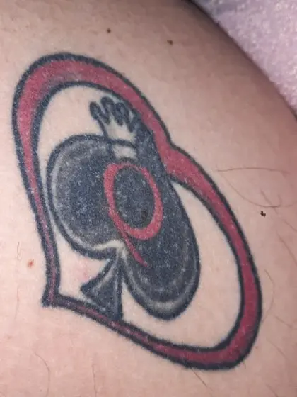 Street hooker Dominica inner thigh QOS TATTOO