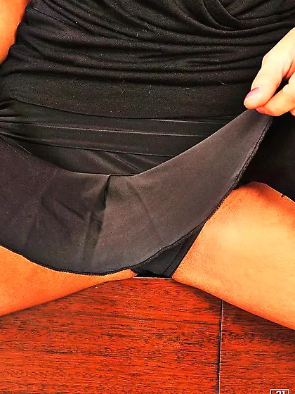 Sophie Moone takes her slutty black dress on the sofa and toys h