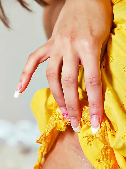 Hot brunette babe Zhanna B is rubbing the pussy slit with the fi