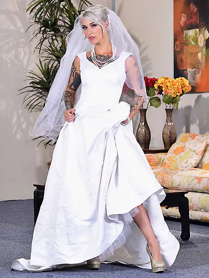 Tatted-up short-haired bride gets fucked by a hung younger guy