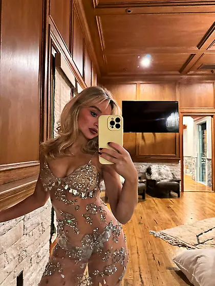 Sabrina Carpenter in a yellow dress