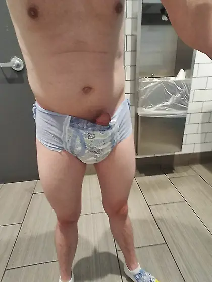 young twink with soaked pull-up shows off in publi