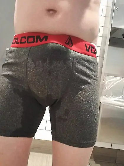 young twink with soaked pull-up shows off in publi