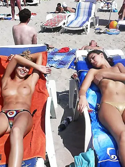 Timid damsels naked on the beach