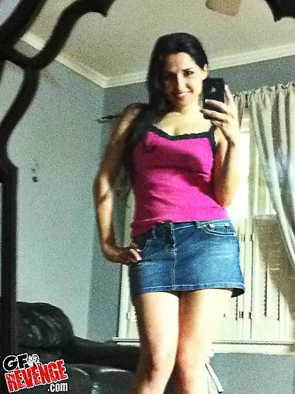 Tempting brunette gal flaunts her trimmed pussy and tits in fron