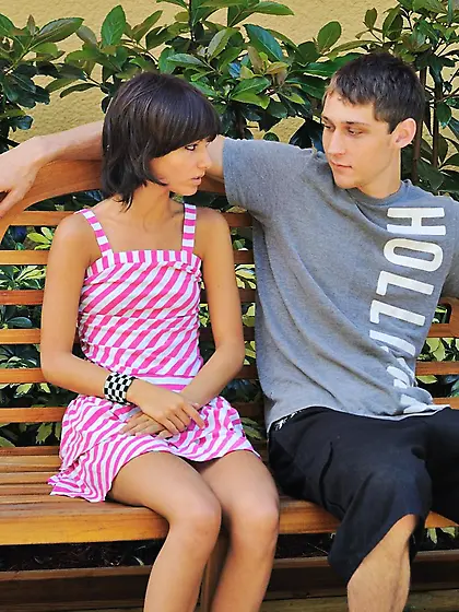 Petite brunette Mishka FTV in pink dress gives blowjob to her bo