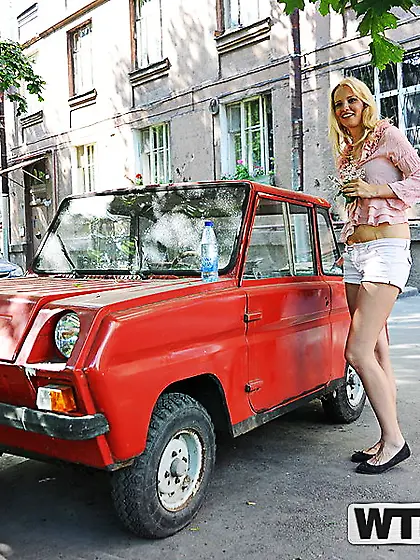 Greta A shows her odd booty and cute tits while outside