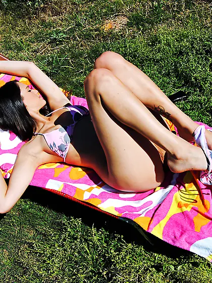 Hot brunette model Tiffany Thompson spreads her legs and shows h