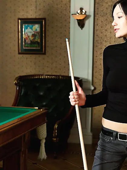 Loreen A takes her clothes near the pool table and exposes her a