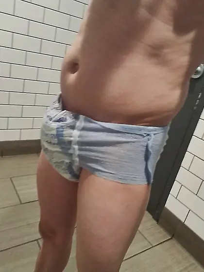 young twink with soaked pull-up shows off in publi