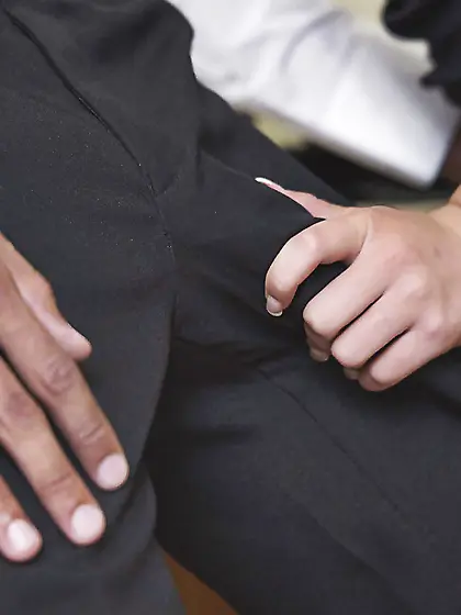 Long-haired office girl with glasses gives co-worker blowjob in