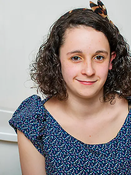 Amateur curly-haired chick Hanna Bollie in stockings teases with