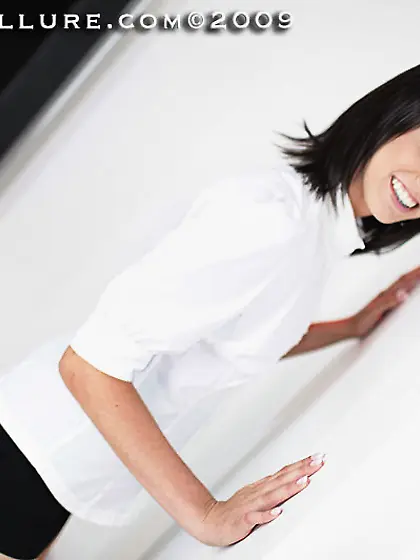 Beautiful cum loving brunette Riley Allure shows her slit and mi